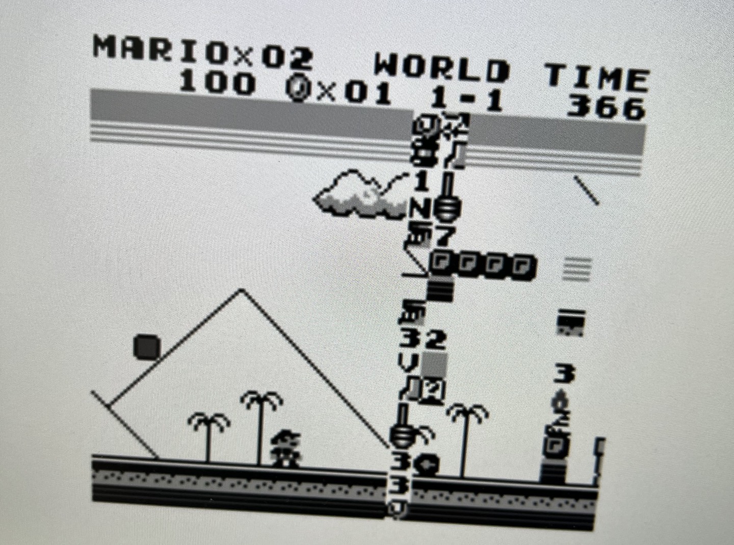 Mario facing an impassible wall of glitched tiles