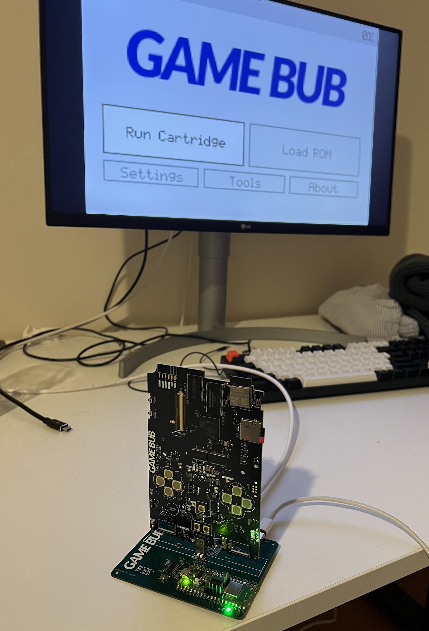 Game Bub PCB on the dock, connected to an external monitor